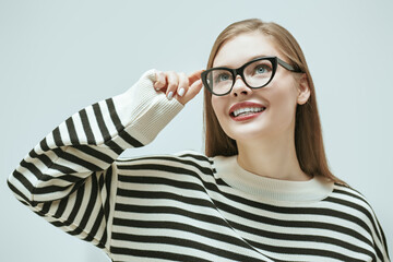 joyful girl in glasses