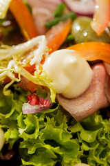 Fresh Vegetable Salad on black plate