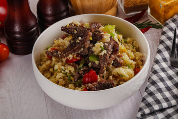Traditional couscous with beef and vegetables