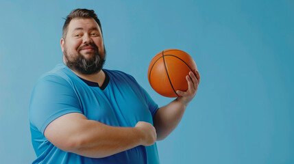 Bearded man in a blue jersey smiling with a basketball, blue background