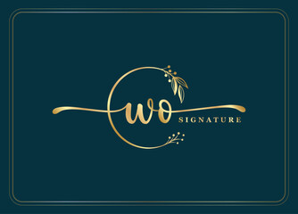 luxury gold signature initial WO logo design isolated leaf and flower