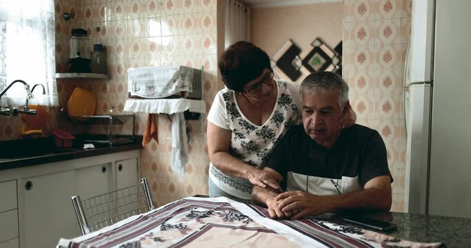 Aged Husband Battling Mental Health Issues, Supportive Spouse Aiding in Age-Related Crisis,  Kitchen Emotional Scene. SUPPORT and HELP intimate relationship