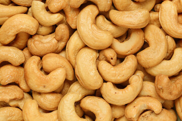 roasted cashew nuts closeup for backgrounds