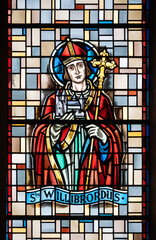 Saint Willibrord, the Apostle to the Frisians. A stained-glass window in Église de la Sainte-Trinité (Holy Trinity Church) in Walferdange, Luxembourg.