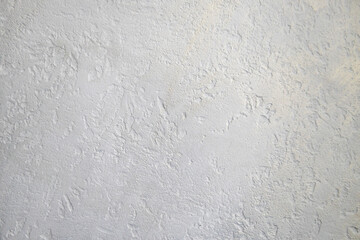 Beautiful Silver white background texture - abstract background from plaster covered mother-of-pearl enamelled