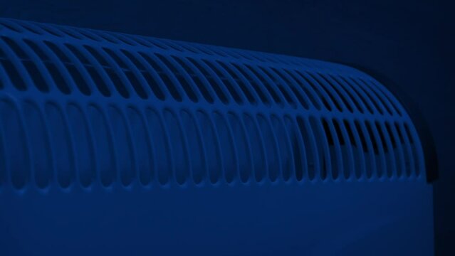 Radiator Heats Room At Night Closeup Shot
