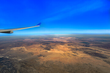 Aircraft wing over desert western United States Blue Sky