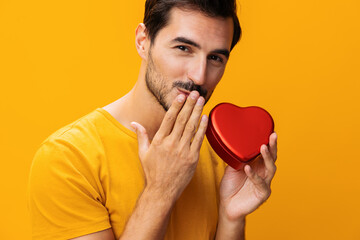 Man love portrait shape romantic studio concept heart gift happy romance valentine yellow
