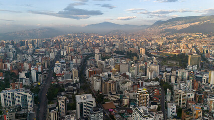 Aerial drone view of Quito capital city of Ecuador South America Parque La Carolina Sunrise early...