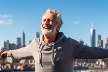 Portrait of a cheerful man in his 80s sporting a long-sleeved thermal undershirt in vibrant city skyline - obrazy, fototapety, plakaty