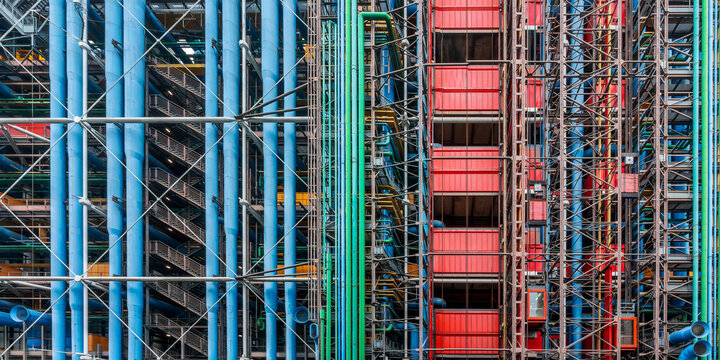 Abstract facade at Centre Pompidou (or Beaubourg), colorful inside-out modern architecture by Renzo Piano and Richard Rogers in Paris France