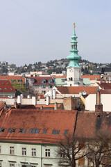 Obraz premium View of the Old Town from the Castle Hill, Bratislava, Slovakia. Street view, old red roofed houses. Spring in Europe. 