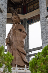 The Buddha Statue of the Chinese Buddhist Temple Kek Lok Si to the City of George Town on Penang in...