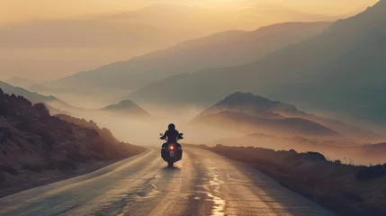 Fotobehang Luxury cruiser motorcycle with the soul of a lone wolf, riding through misty mountains at dawn, first light breaking through © kitinut