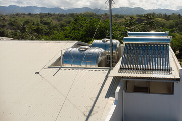 solar water heater on the roof of a house