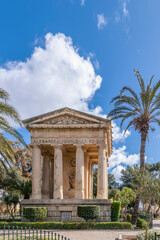 Fototapeta na wymiar The Monument to Sir Alexander Ball is a neoclassical monument in the Lower Barrakka Gardens, Valletta, Malta