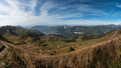 Panoramic view of Swiss Alps from Klingenstock summit, Switzerland. Stoos village and cable car