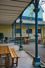 inner courtyard of a building used as a pub room before opening