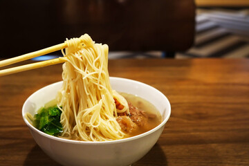 A bowl of misua or wheat vermicelli with beef tendon. - obrazy, fototapety, plakaty