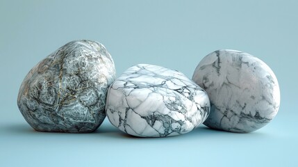 Marble rocks on light blue background