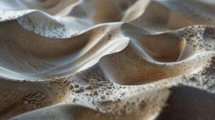 Expanses of desert landscapes with grains of sand shimmering in the warm sunlight