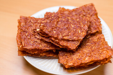 Close up sliced sheets of dried sweet pork