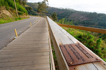 Sra da Piedade wooden walkway in Serra da Lousã-Portugal. - obrazy, fototapety, plakaty