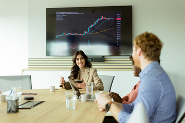 Dynamic corporate strategy session in a modern boardroom on a bright afternoon