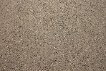 Close up of brown road surface with fine texture