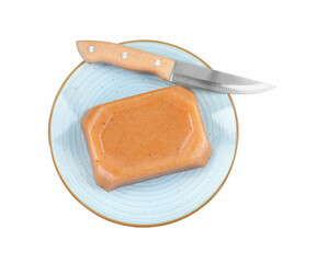 Delicious sweet quince paste and knife isolated on white, top view
