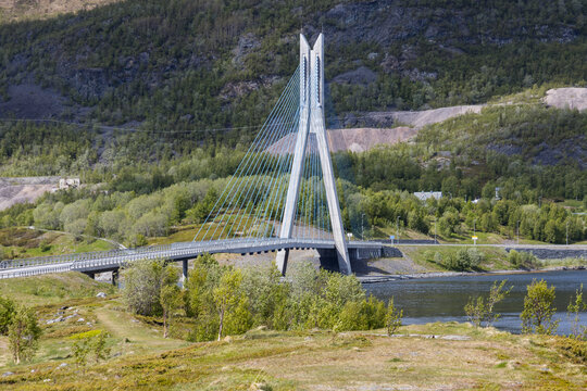 Suspension bridge spanning over Kåfjordbotten fjord in Norway near Alta.