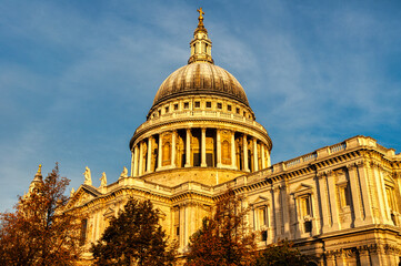 Fototapeta na wymiar St Pauls Cathedral in London, glowing in the Autumn sun.
