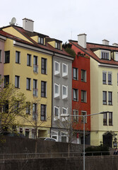 Naklejka premium Colorful facades of houses close up photo. Architecture of Europe. 
