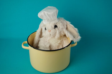  Chef's hat, plush rabbit in a bowl. 