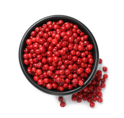 Aromatic spice. Red pepper in bowl isolated on white, top view