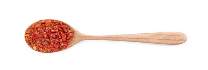 Aromatic spice. Red chili pepper flakes in spoon isolated on white, top view