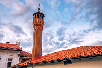 architectural marvels of Sarajevo's wooden mosque minarets, reflecting the intricate craftsmanship of Ottoman design and Bosnian culture. - 786492577