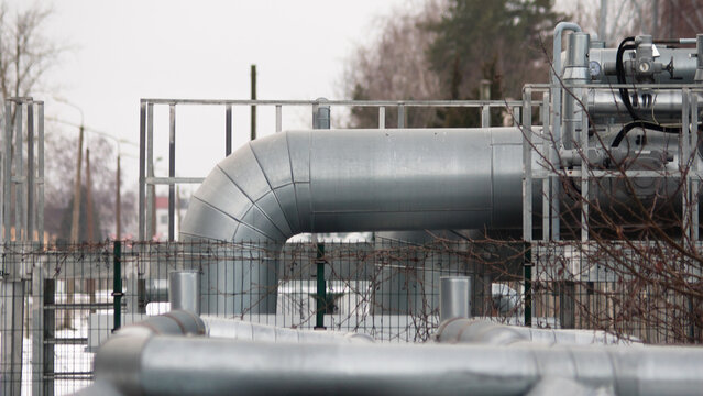 pipeline design close-up against gray sky