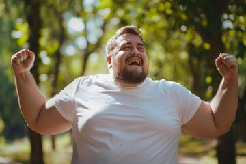 Cheerful overweight man in athletic attire exercising outdoors for weight reduction in sunny park
