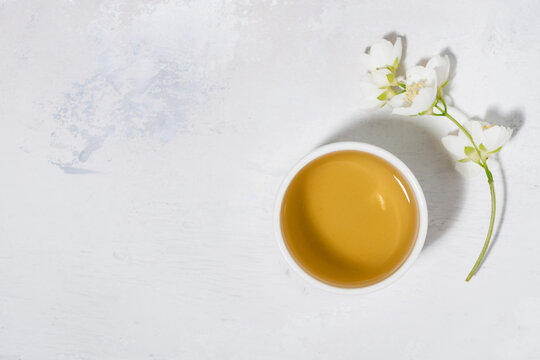 pialat with green tea on a white background and jasmine