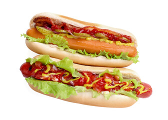 Tasty hot dogs with different toppings isolated on white, top view