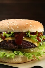 Burger with delicious patty on table, closeup