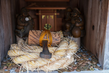 Hammer to ring bell at Tozan Sueyama shinto shrine, Imari