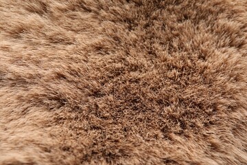 Texture of faux fur as background, closeup