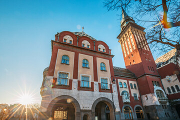 panoramic view of Subotica Town Hall as a focal point of the cityscape, its intricate decoration and grandeur attracting tourists - 786530305
