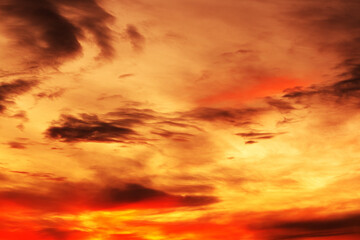 Background of a beautiful bright orange sunset with cirrus clouds - 786536508