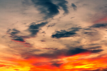 Background of a beautiful bright orange sunset with cirrus clouds - 786536517