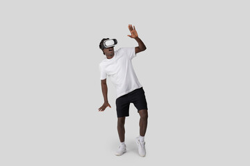 African American man using VR headset on white background