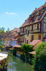 Old town of Colmar with the river Lauch in Alsace in France