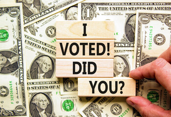 I voted. Did you symbol. Concept words I voted. Did you on beautiful wooden block. Beautiful dollar...